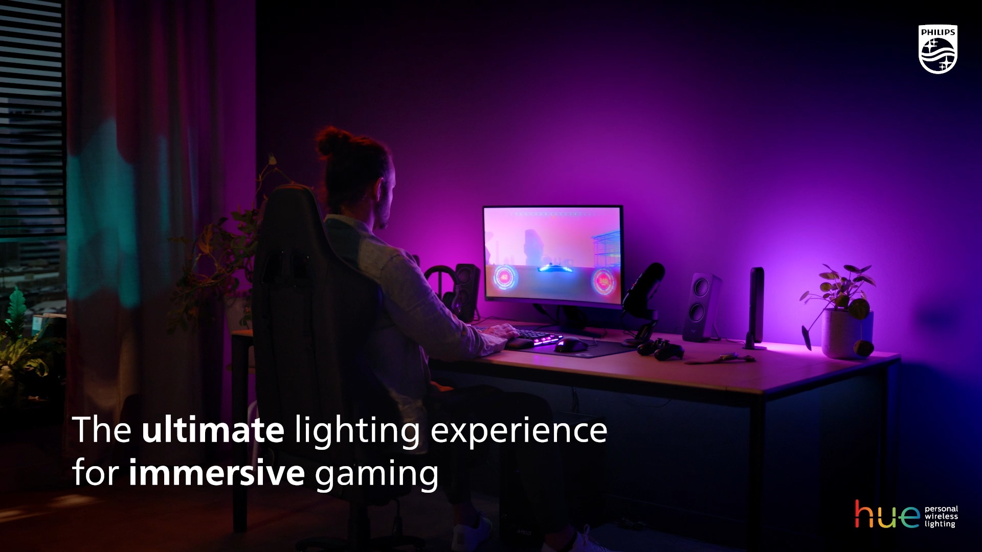Philips Hue Play Gradient Lightstrip behind a 27-inch monitor